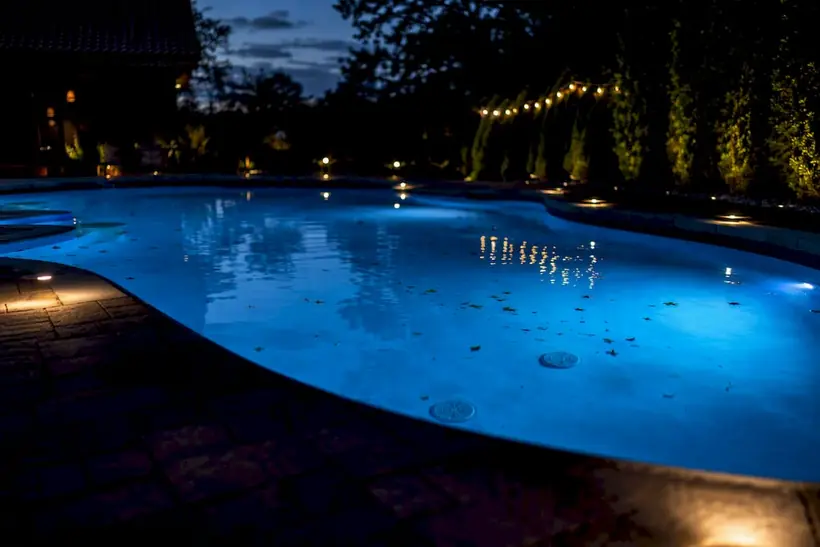 Underwater and deck lighting enhancing nighttime pool safety