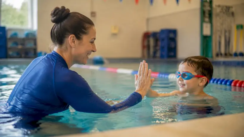 Children at swim lesson trial with instructor